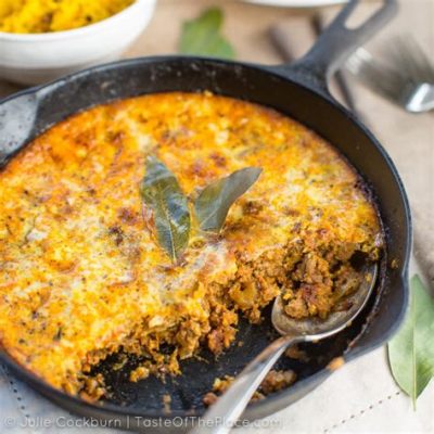  Bobotie Au Fromage: Une symphonie épicée de saveurs sud-africaines et une explosion crémeuse en bouche !