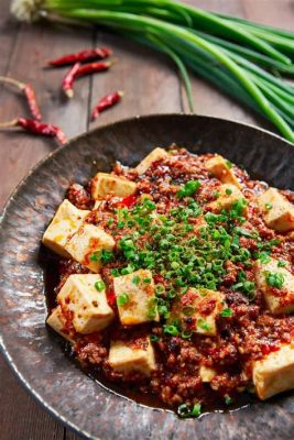  Le Tofu Mapo: Une symphonie épicée et onctueuse qui danse sur votre palais!